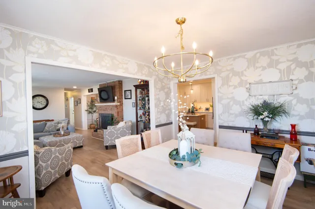 a view of room with window and flat screen tv