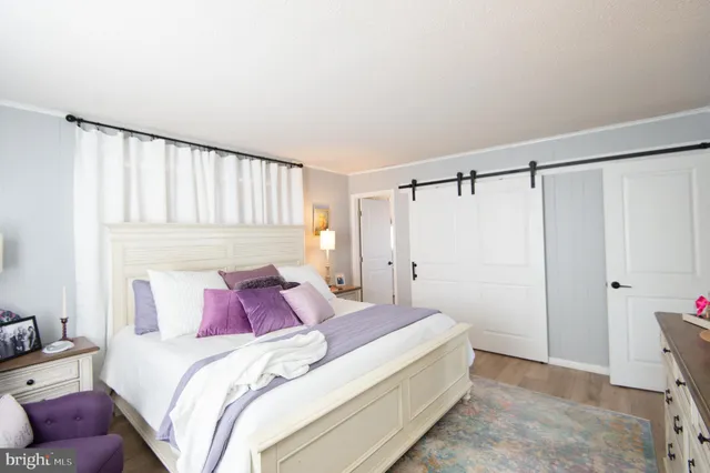 a view of a building with a snow on the road