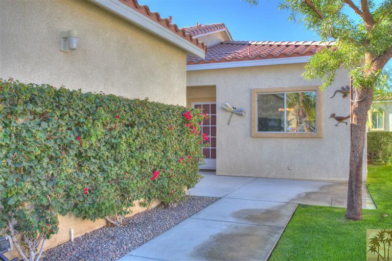 49121 Biery Street Indio, CA 92201 - Photo 2 of 25 a view of a house with garage