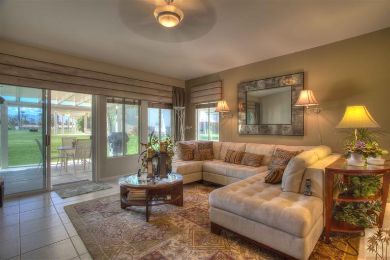 49121 Biery Street Indio, CA 92201 - Photo 13 of 25 a living room with furniture and a lamp