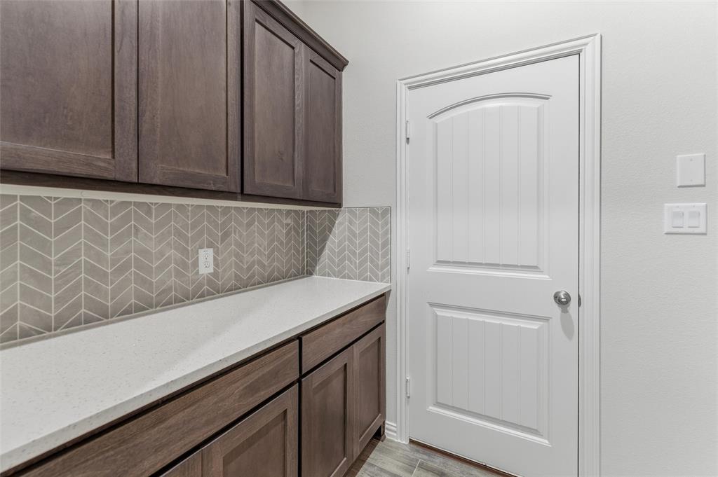 119 Hillview Trail Decatur, TX 76234 - Photo 17 of 30 White shaker-style door with a rounded arch detail