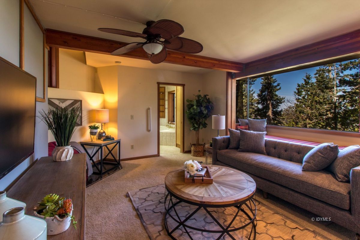 25281 Deer Path Road Pine Cove, CA 92549 - Photo 14 of 42 a living room with furniture and a large window