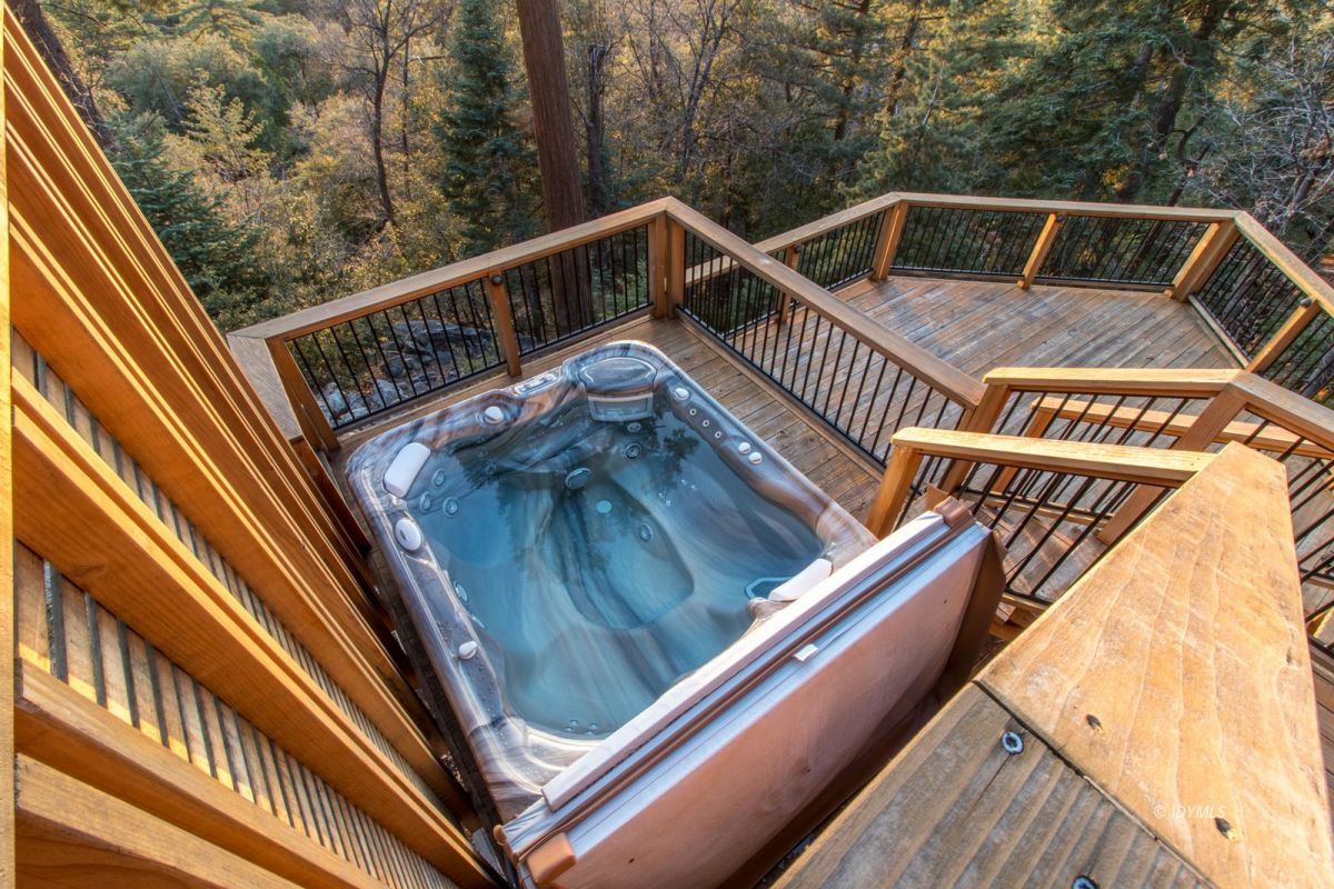 25281 Deer Path Road Pine Cove, CA 92549 - Photo 15 of 42 a view of deck with two chairs and wooden fence