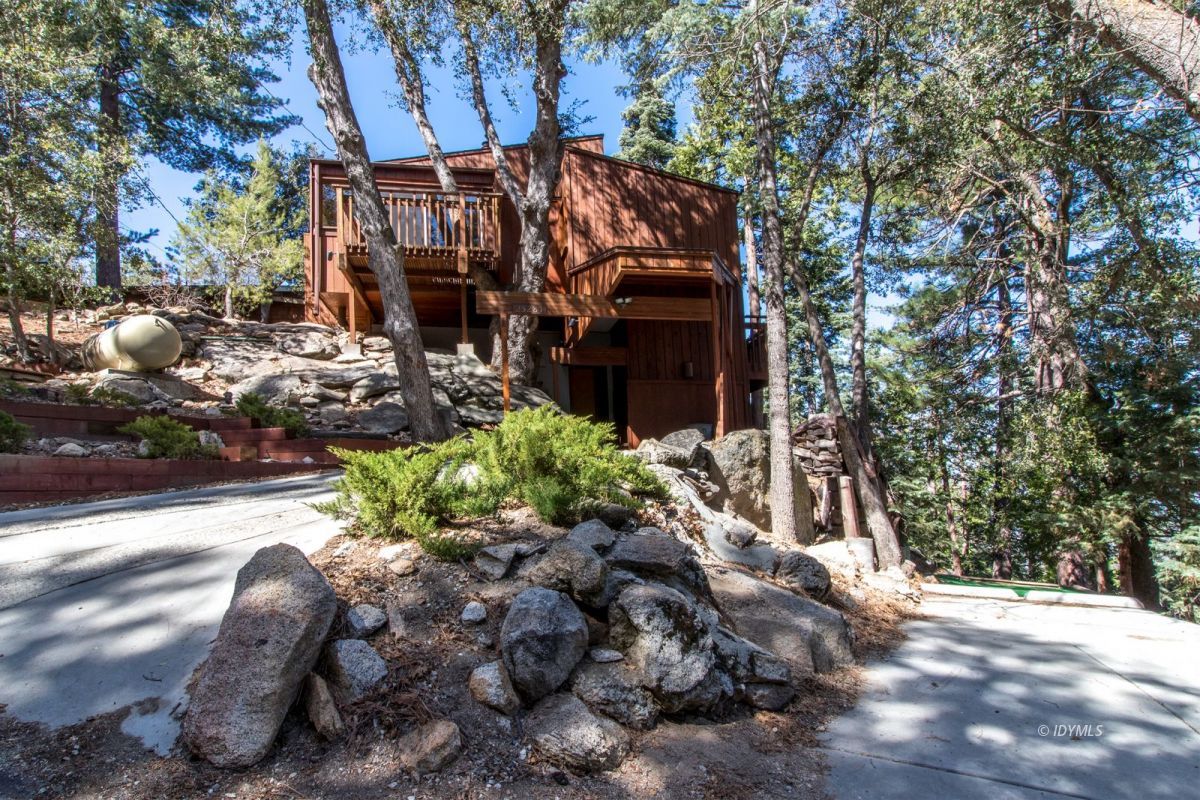25281 Deer Path Road Pine Cove, CA 92549 - Photo 29 of 42 a view of a house with a yard and pathway