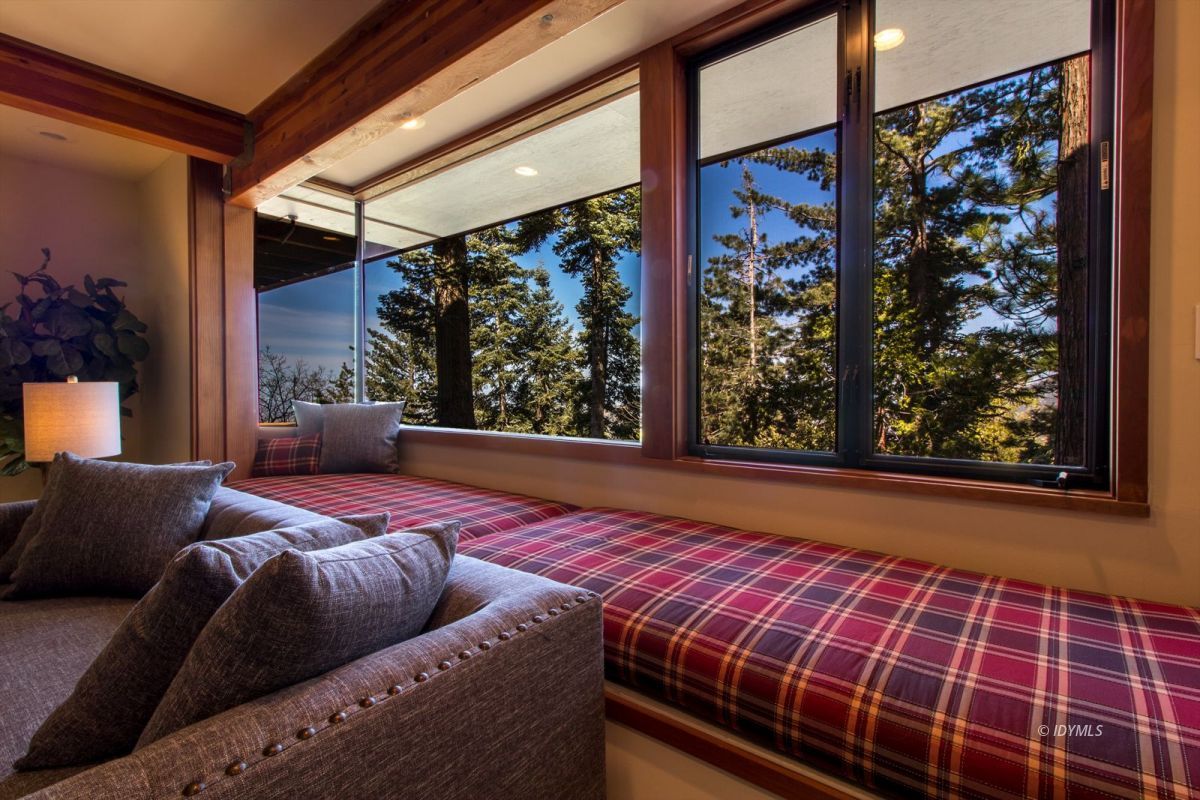 25281 Deer Path Road Pine Cove, CA 92549 - Photo 4 of 42 a view of a balcony with furniture and wooden floor