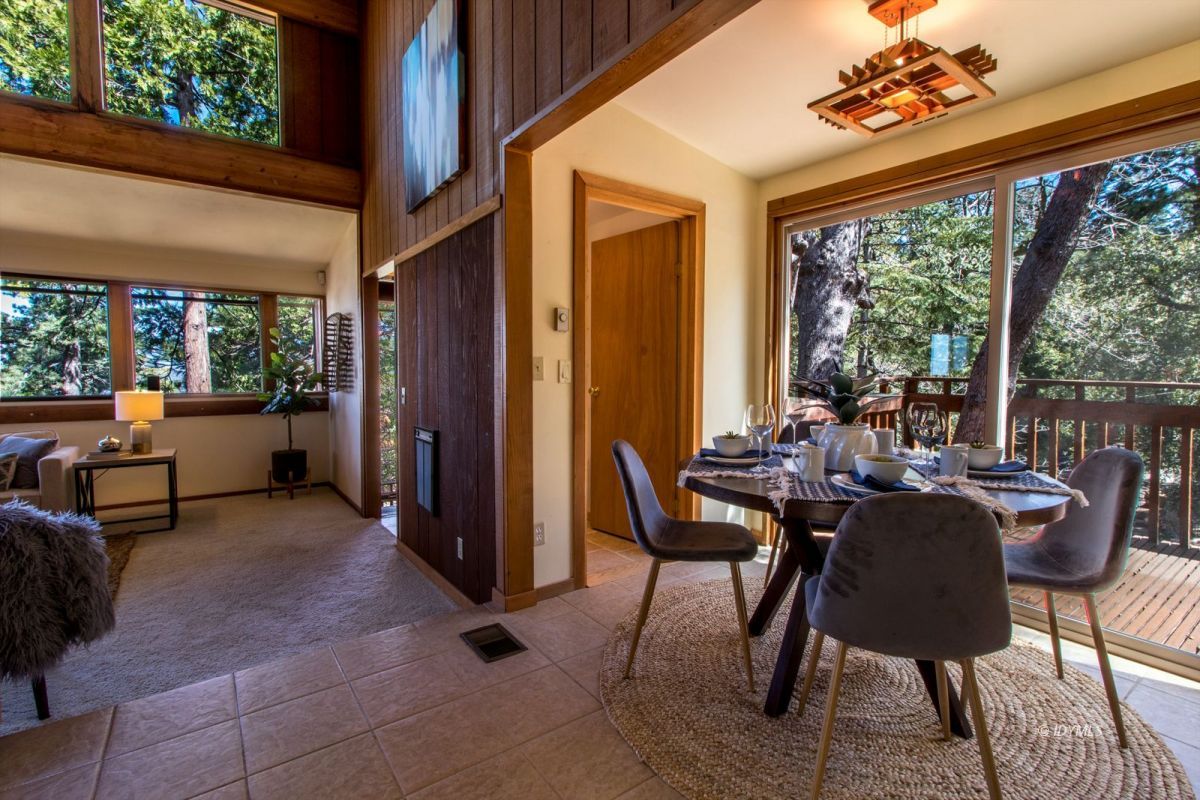 25281 Deer Path Road Pine Cove, CA 92549 - Photo 7 of 42 a view of a dining room with furniture window and outside view