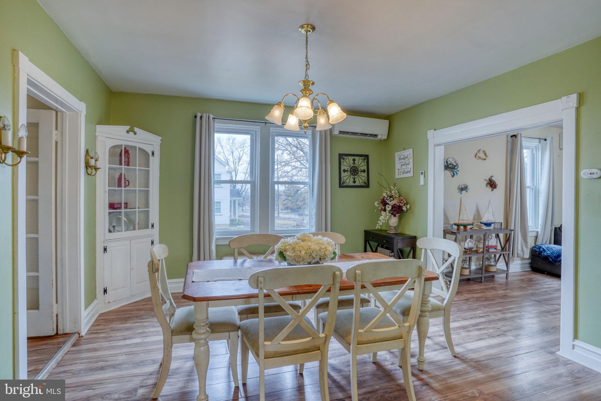 7 Patterson Avenue Perryville, MD 21903 - Photo 13 of 44 a view of a dining room with furniture window and wooden floor