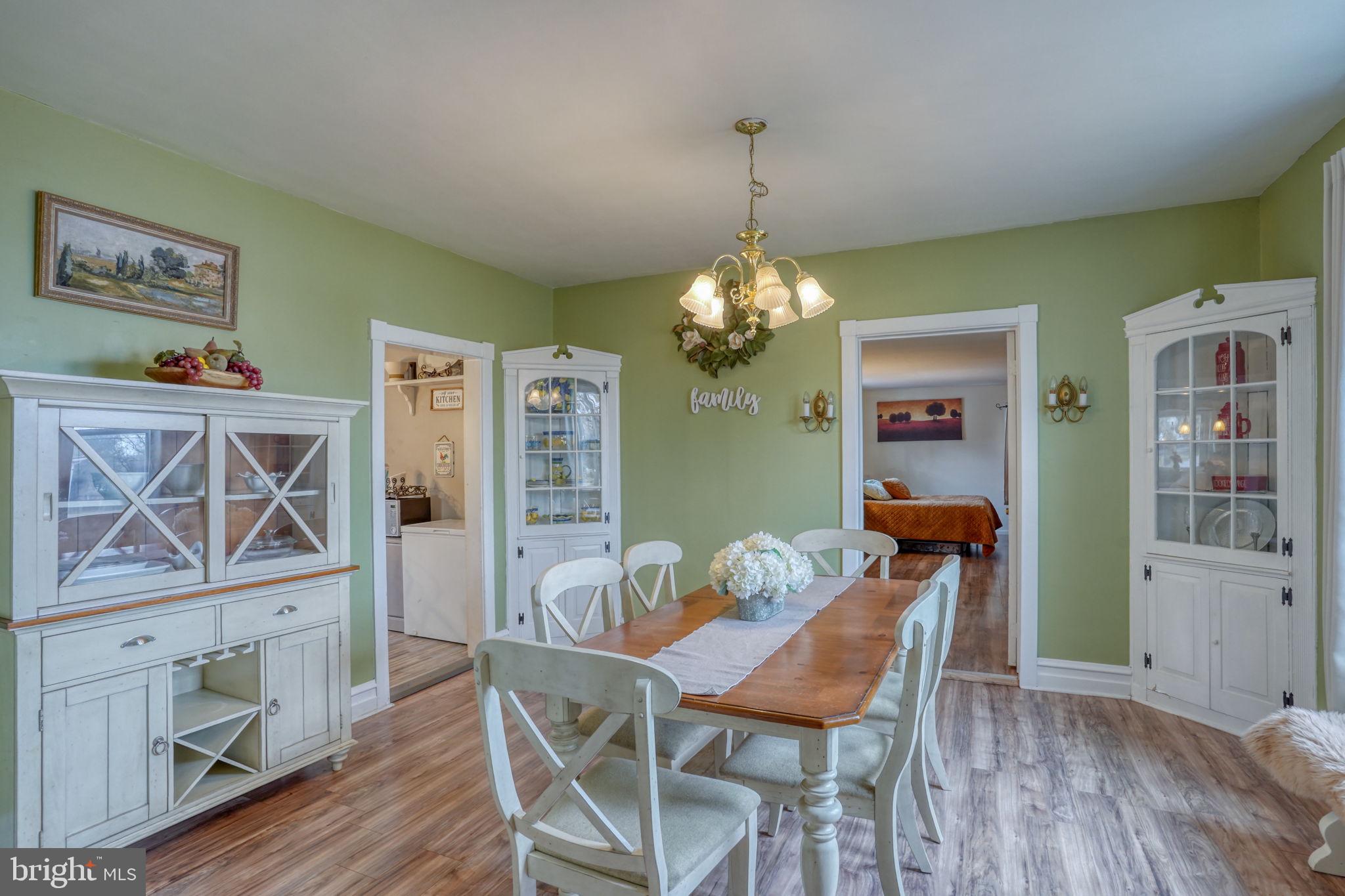 7 Patterson Avenue Perryville, MD 21903 - Photo 16 of 44 a view of a dining room with furniture and chandelier
