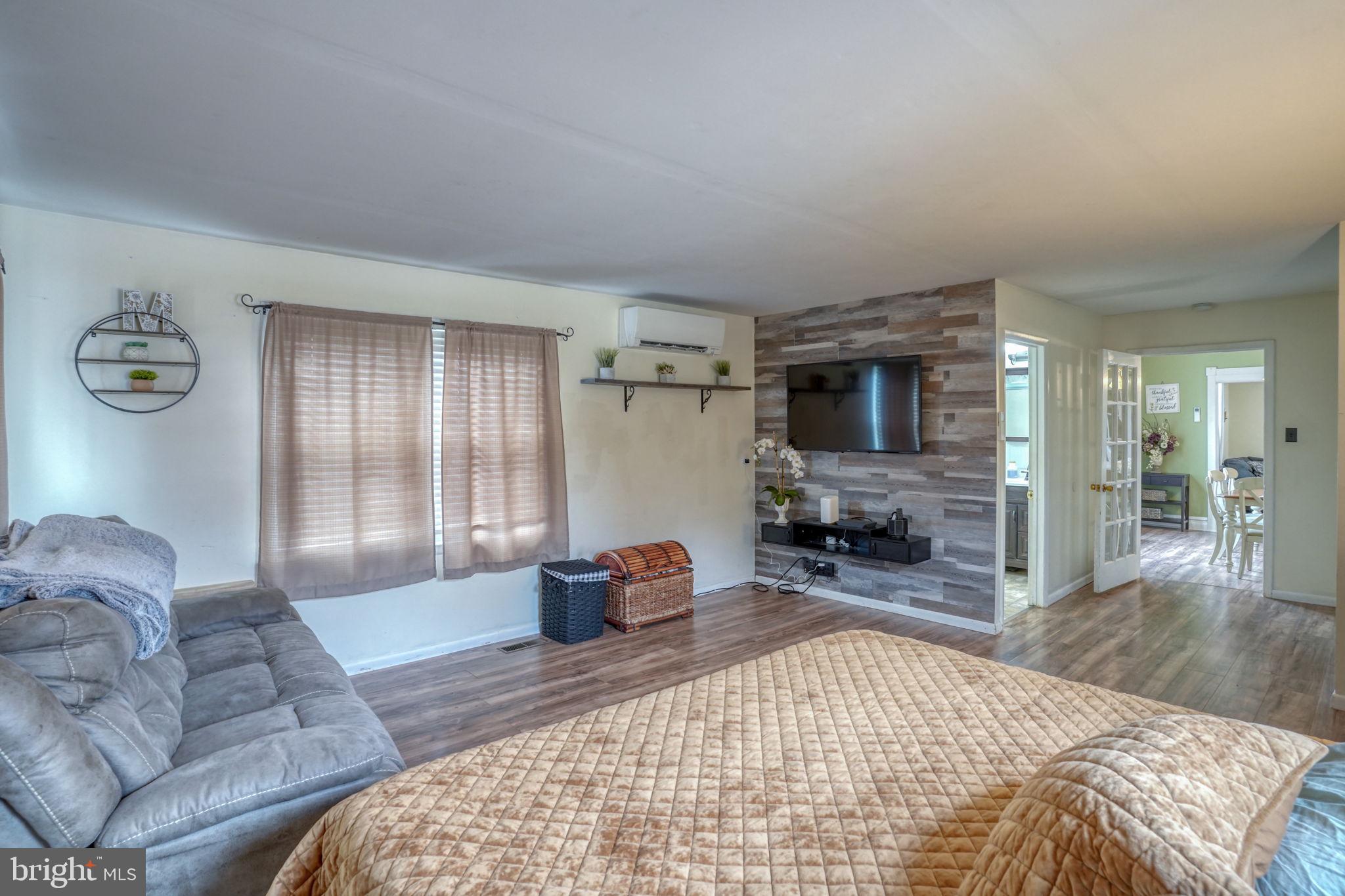 7 Patterson Avenue Perryville, MD 21903 - Photo 20 of 44 a bedroom with furniture and a flat screen tv