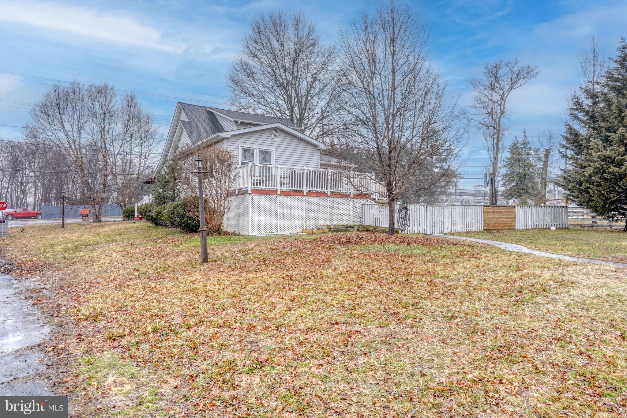 7 Patterson Avenue Perryville, MD 21903 - Photo 33 of 44 a white house that has a tree in front of it