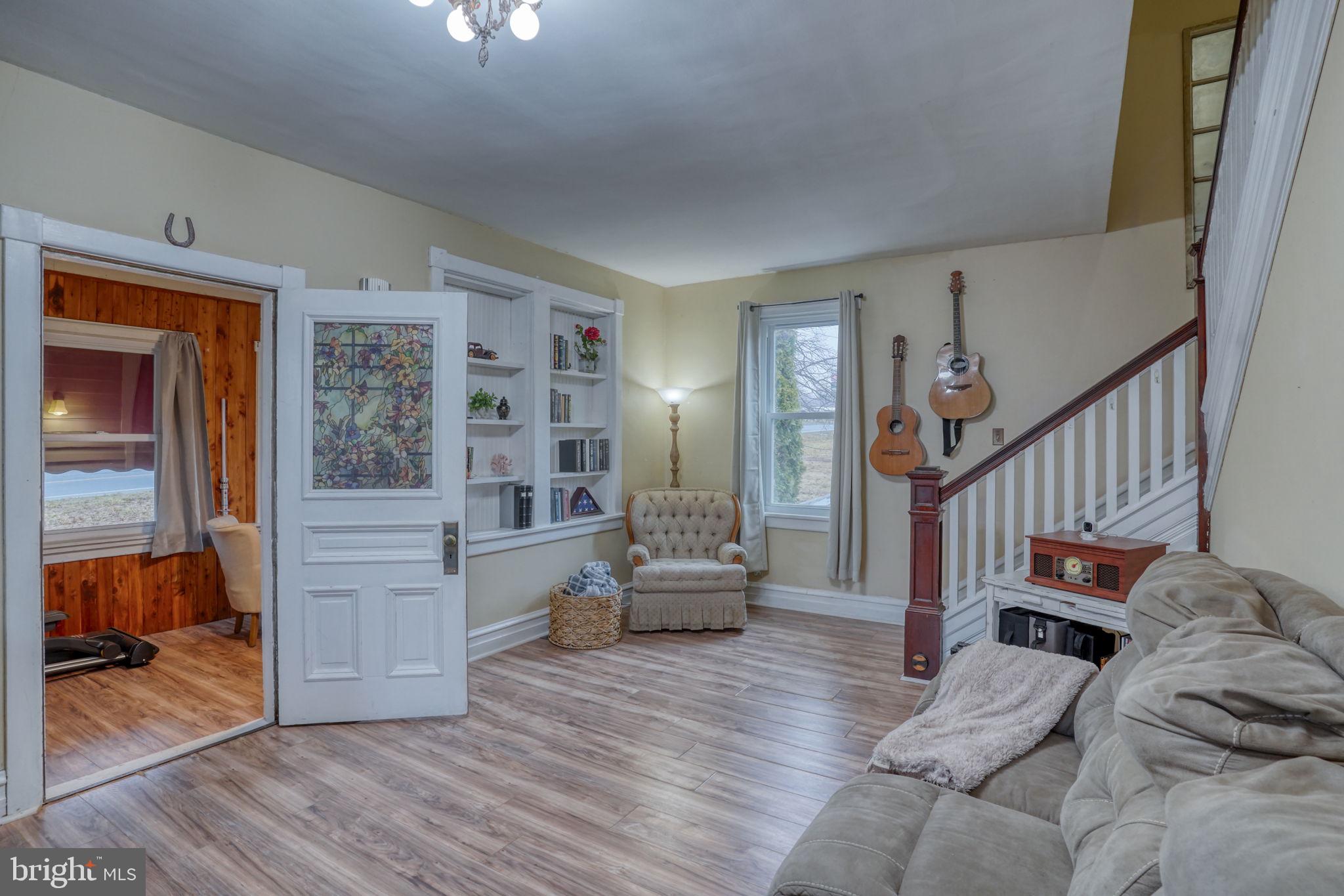 7 Patterson Avenue Perryville, MD 21903 - Photo 4 of 44 a living room with furniture and stairs