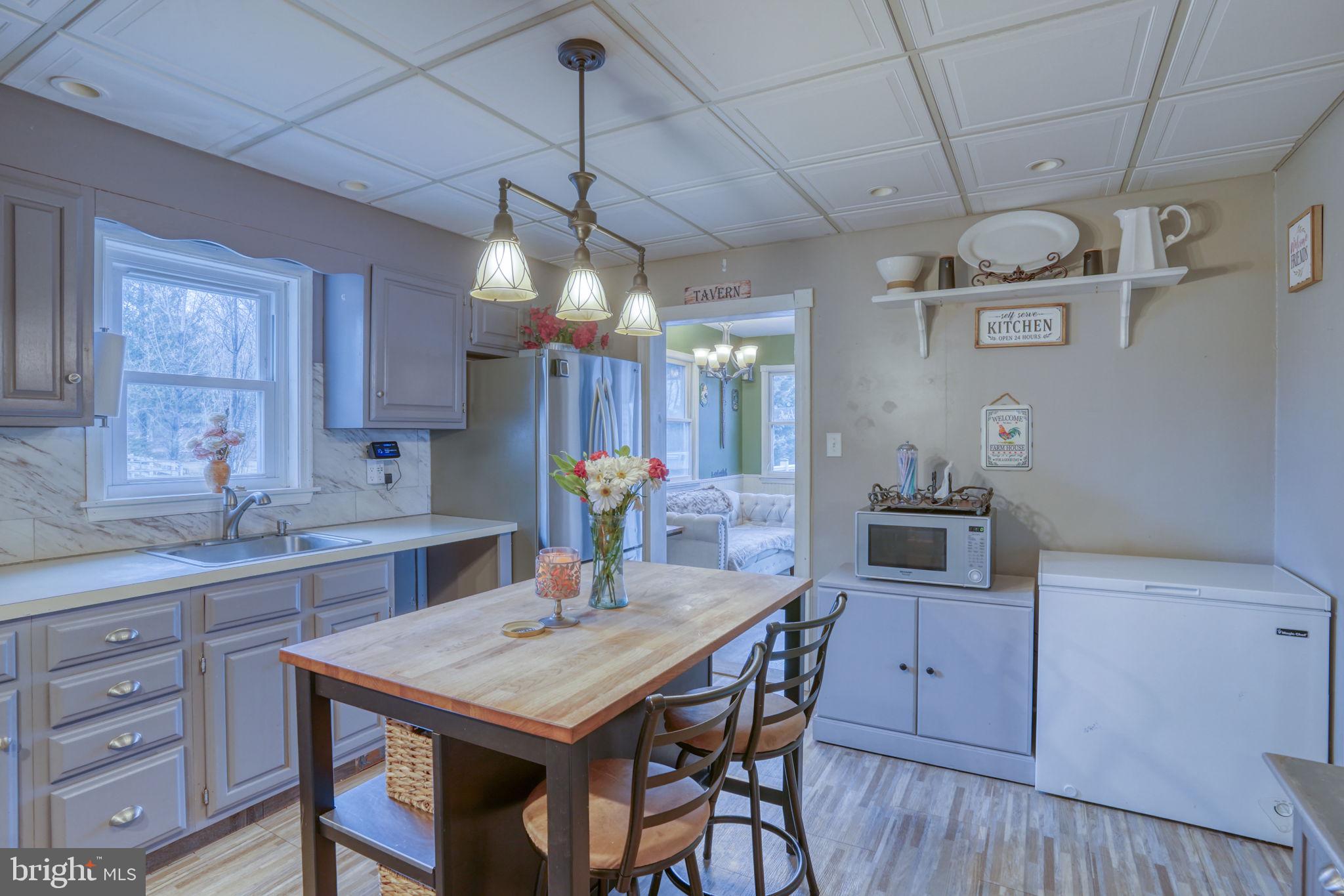 7 Patterson Avenue Perryville, MD 21903 - Photo 8 of 44 a kitchen with a table and chairs in it