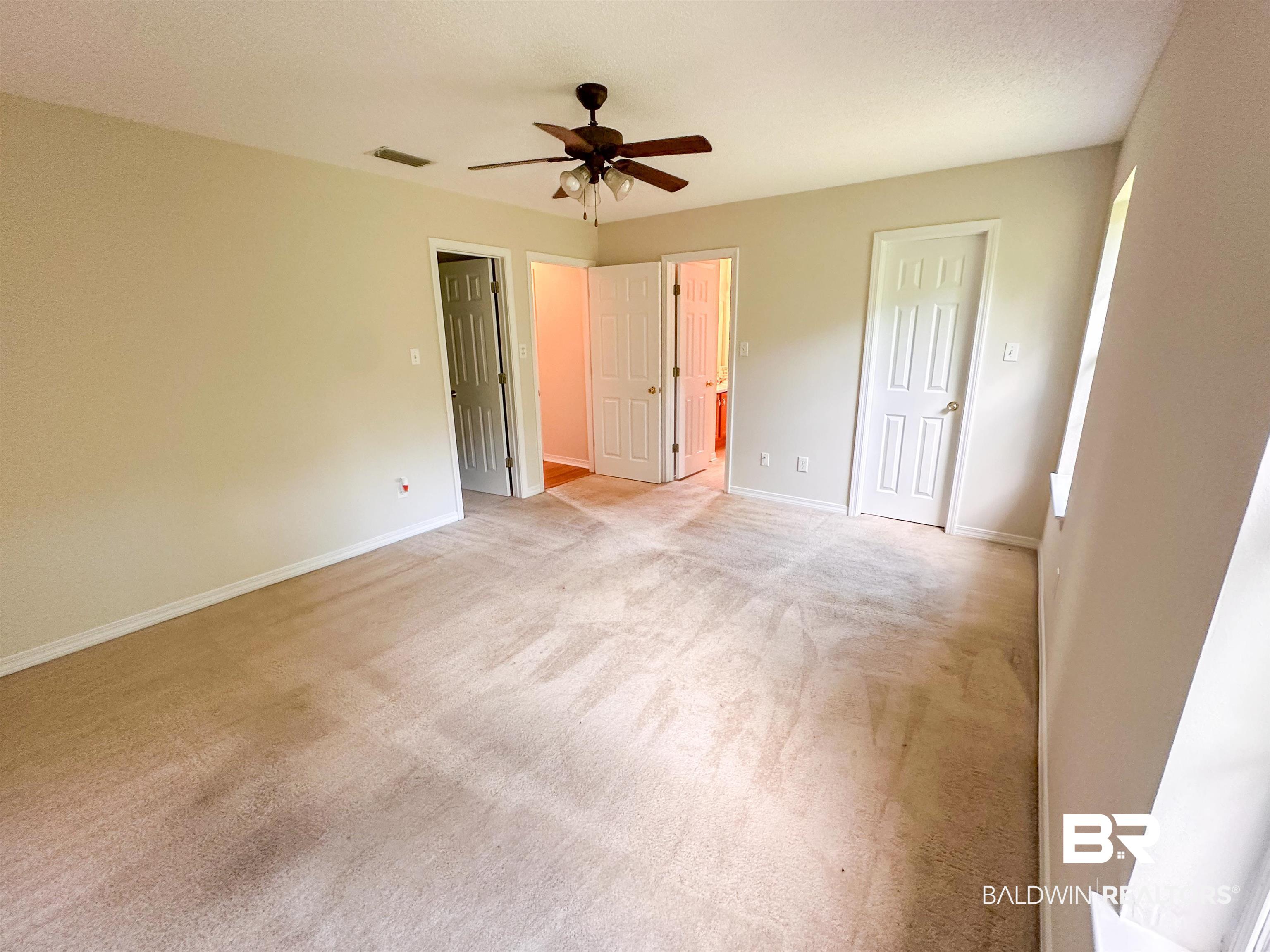 13255 Pointer Drive West Foley, AL 36535 - Photo 18 of 25 Unfurnished bedroom featuring light carpet and ceiling fan