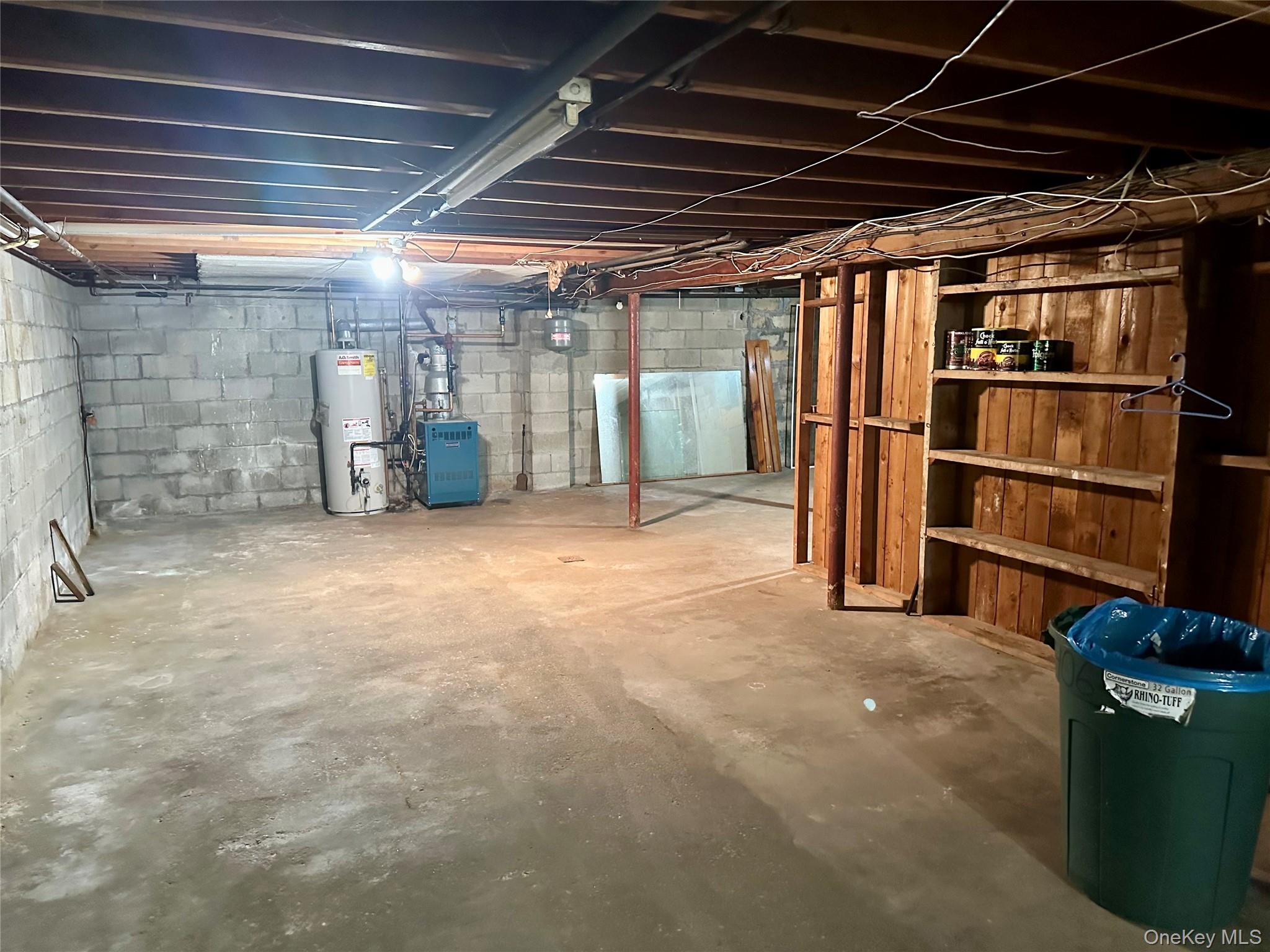406 Moriches Road St. James, NY 11780 - Photo 19 of 28 a view of an empty room with wooden floor