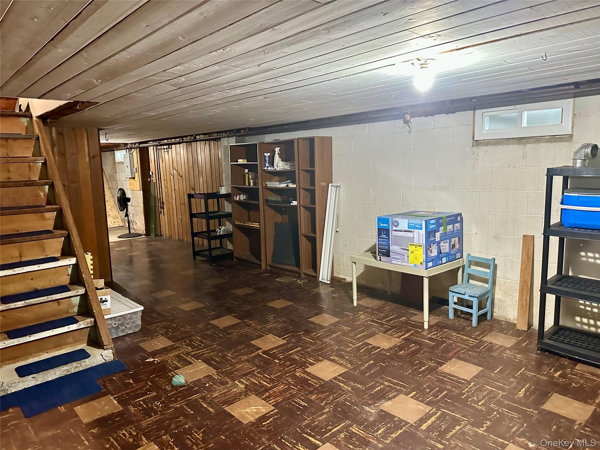 406 Moriches Road St. James, NY 11780 - Photo 20 of 28 a view of a room with shelves