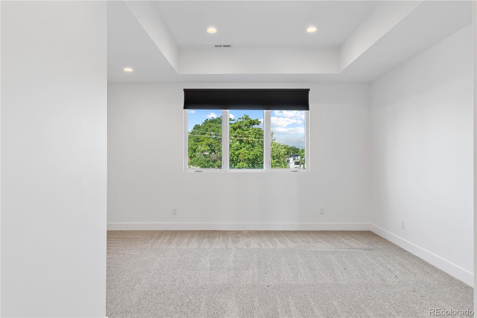 3535 Tejon Street Denver, CO 80211 - Photo 32 of 50 an empty room with a window