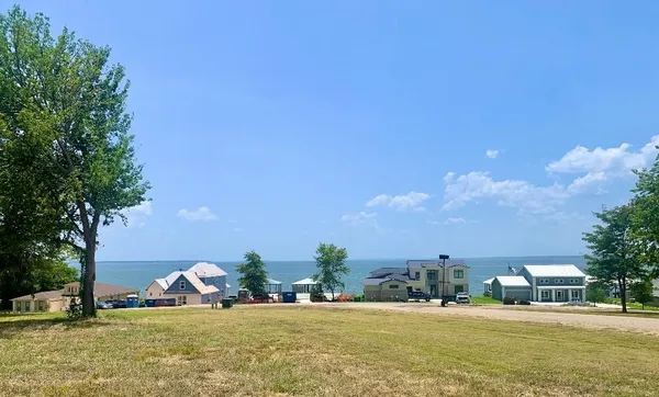 a view of a ocean with houses
