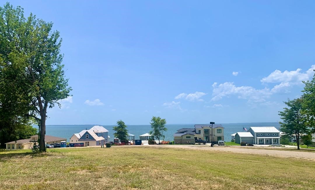 129 Legacy Boulevard Point Blank, TX 77364 - Photo 7 of 11 a view of a ocean with houses