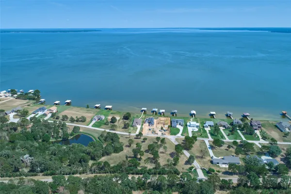 a view of a room with floor to ceiling window and mountain view
