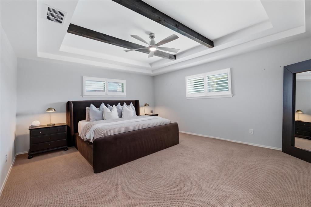 10717 Ferndale Road Dallas, TX 75238 - Photo 17 of 36 a bedroom with bed and window