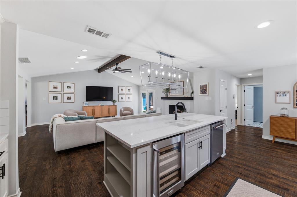 10717 Ferndale Road Dallas, TX 75238 - Photo 29 of 36 a living room with furniture and a flat screen tv