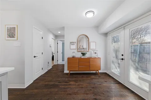 a room with furniture and a wooden floor