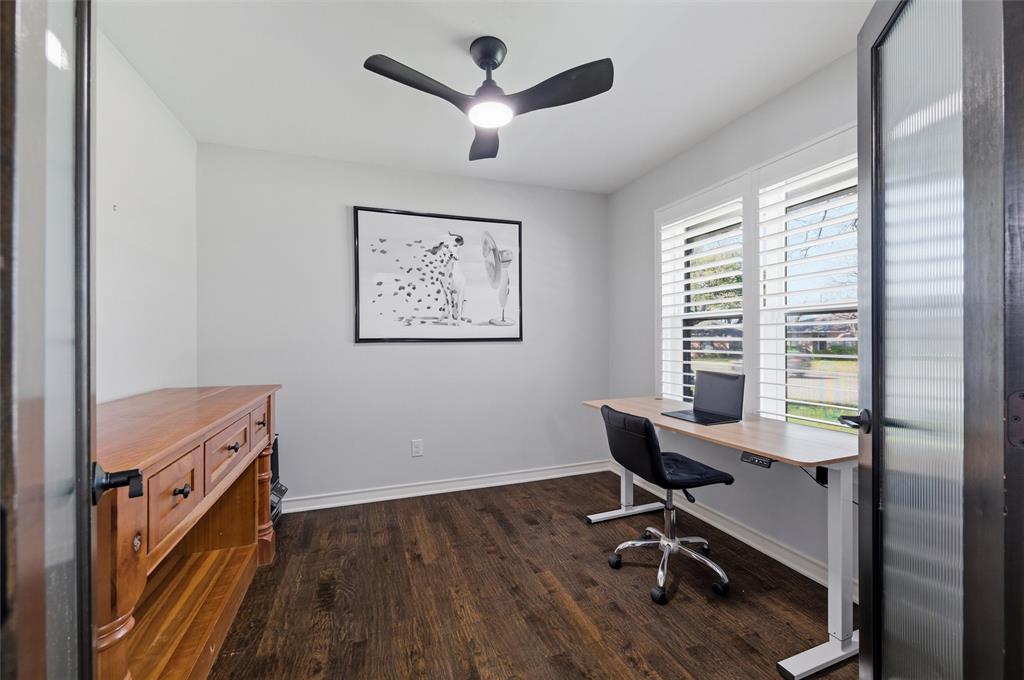 10717 Ferndale Road Dallas, TX 75238 - Photo 6 of 36 a view of a workspace with furniture and a window