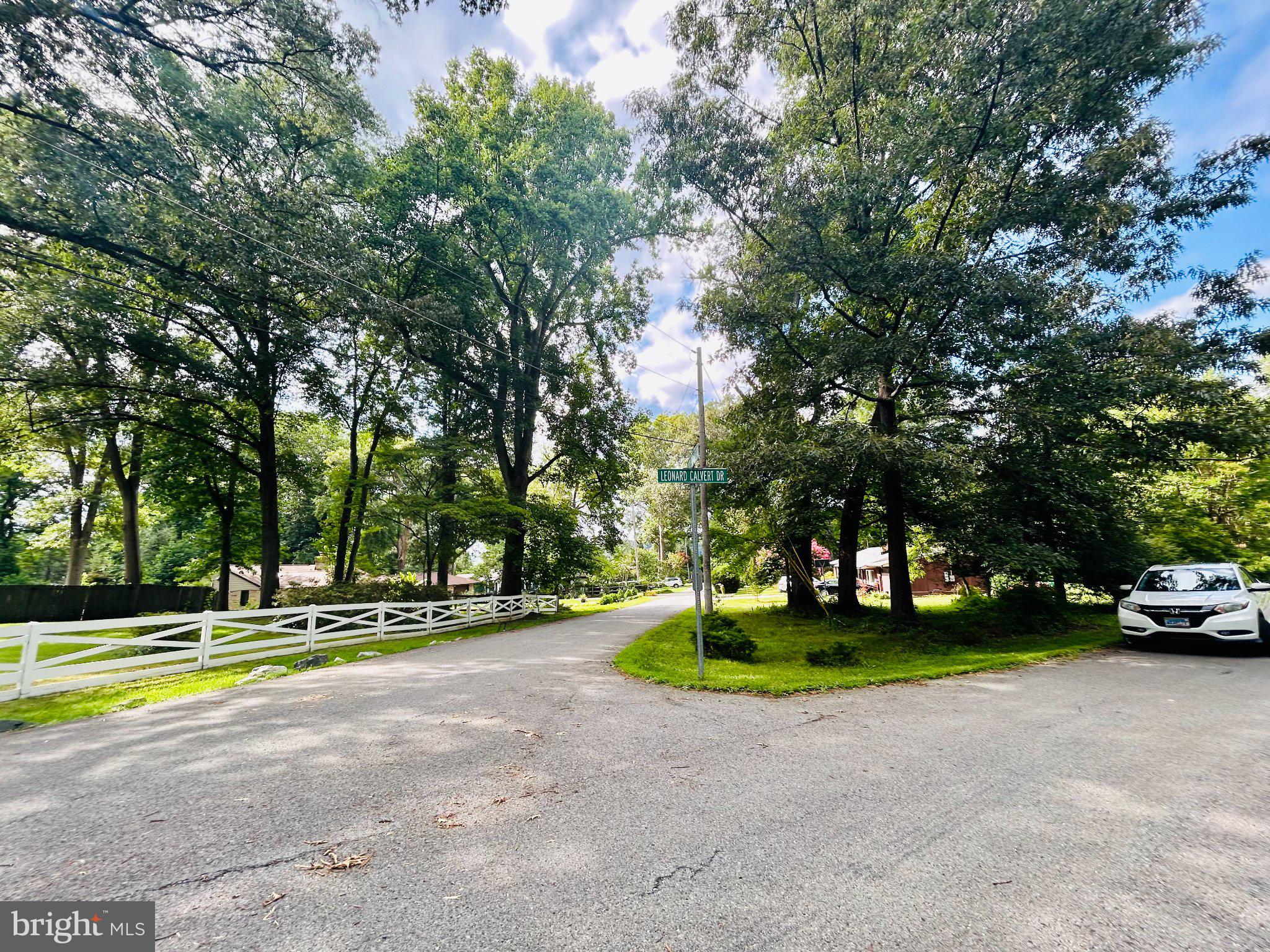 14500 Leonard Calvert Drive Accokeek, MD 20607 - Photo 6 of 18 Serene tree-lined neighborhood corner.