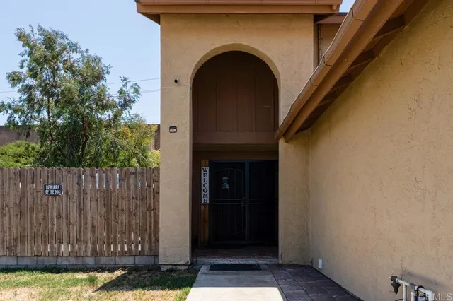 a view of entrance gate of house