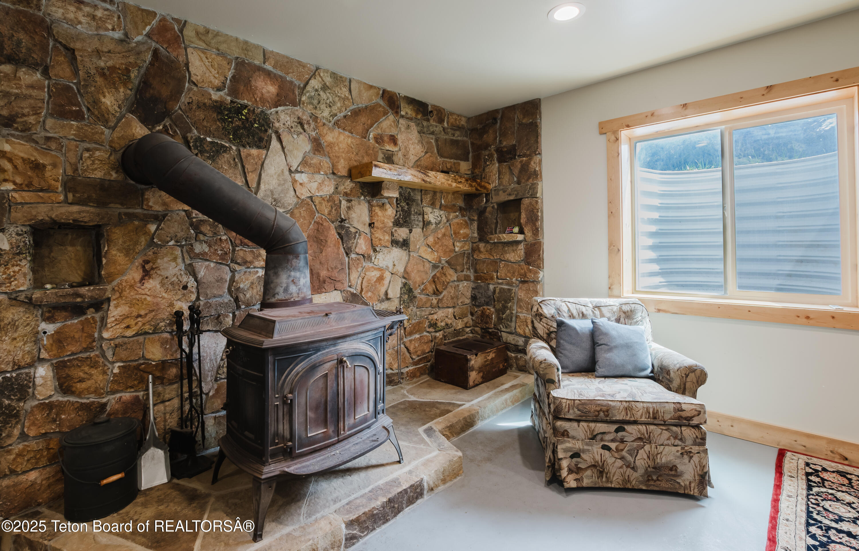 222 River Bench Road Alpine, WY 83128 - Photo 17 of 28 woodstove