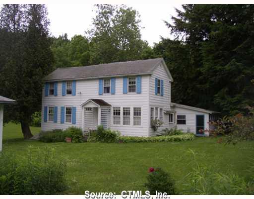 39 Furnace Road Salisbury, CT 06039 - Photo 1 of 1 a front view of a house with a garden
