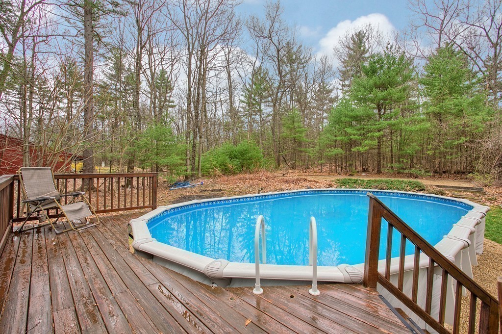 86 Squannacook Road Shirley, MA 01464 - Photo 2 of 30 a view of deck with seating space and trees