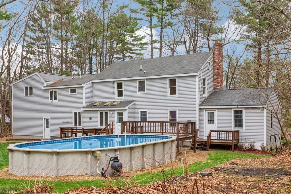 86 Squannacook Road Shirley, MA 01464 - Photo 28 of 30 front view of a house with a yard table and chairs