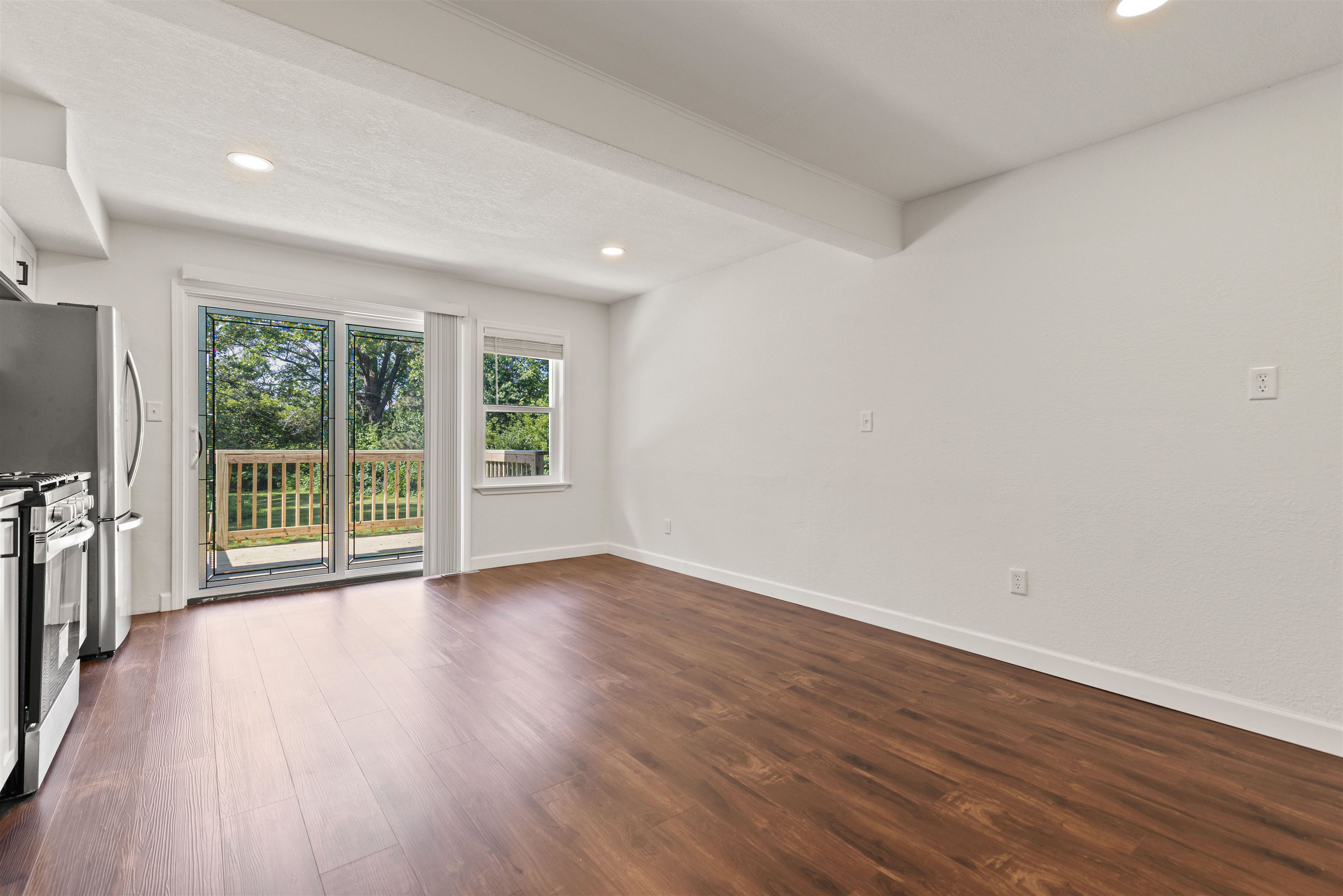 7330 Olde Creek Road Rockford, IL 61114 - Photo 8 of 20 a view of a room with wooden floor and outer view