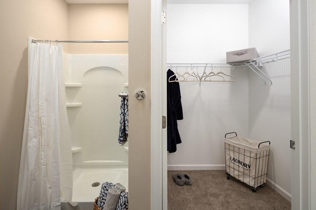 100 Harvest Grove Lane Southeast, Unit ROLAND Calhoun, GA 30701 - Photo 13 of 16 a bathroom with a shower