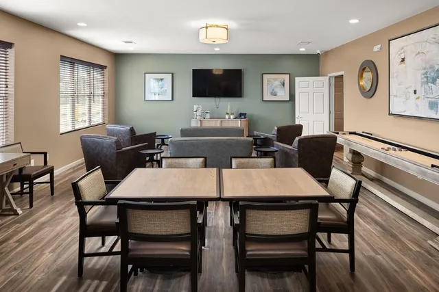 a view of a dining room with furniture