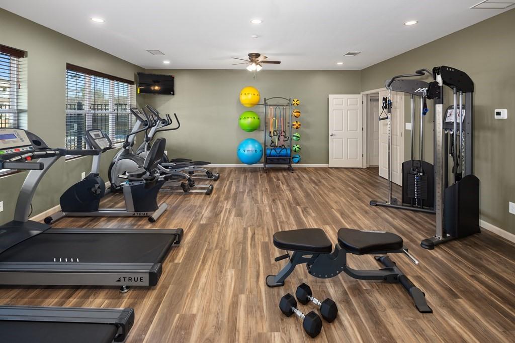 100 Harvest Grove Lane Southeast, Unit ROLAND Calhoun, GA 30701 - Photo 9 of 16 a view of a room with gym equipment