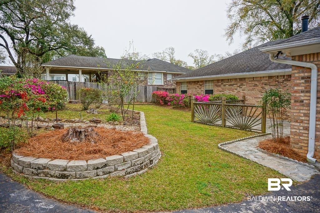 7225 Smithfield Road East Mobile, AL 36695 - Photo 26 of 27 View of yard featuring fence