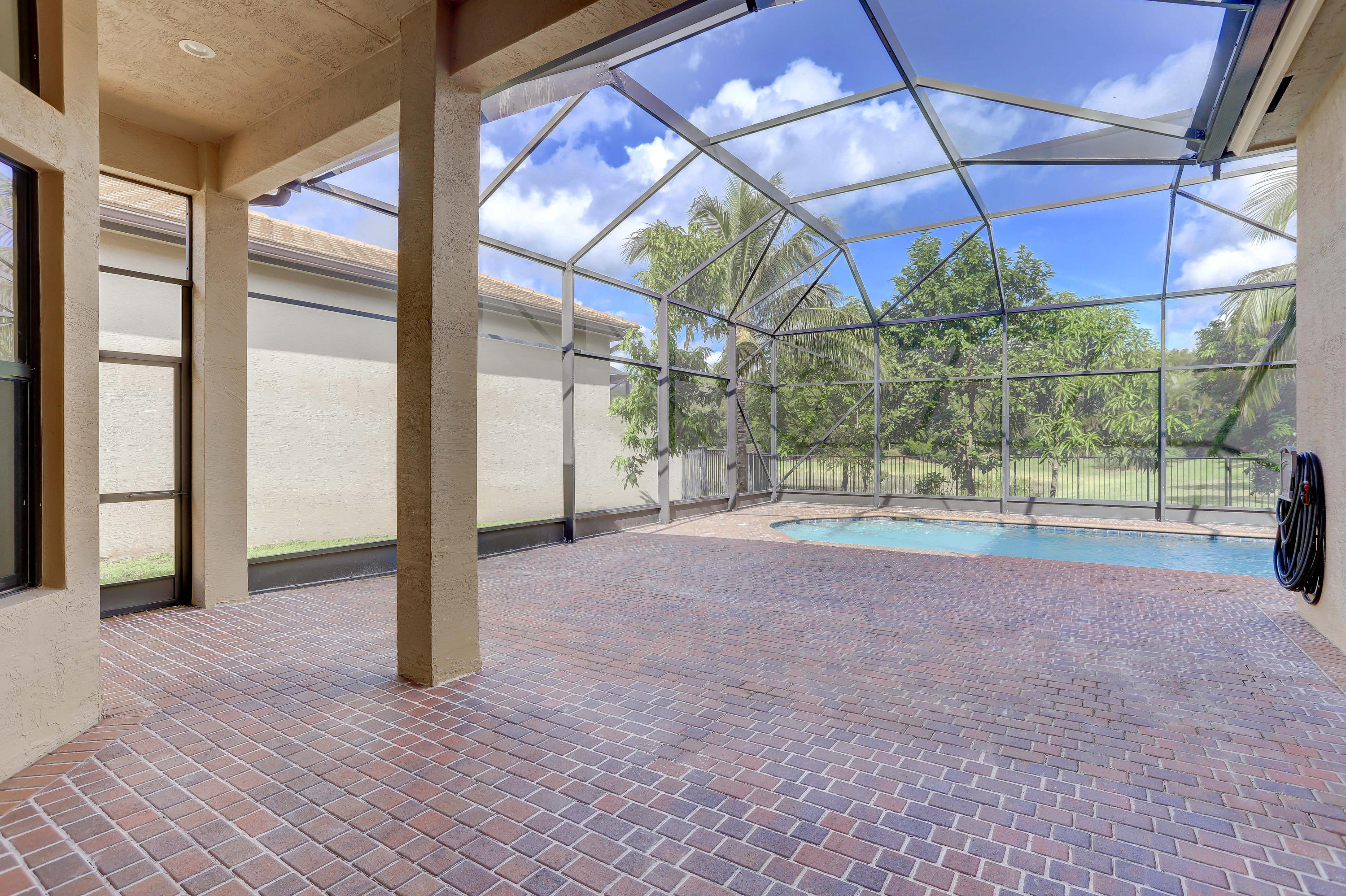 9451 Eden Roc Court Delray Beach, FL 33446 - Photo 12 of 39 Covered patio