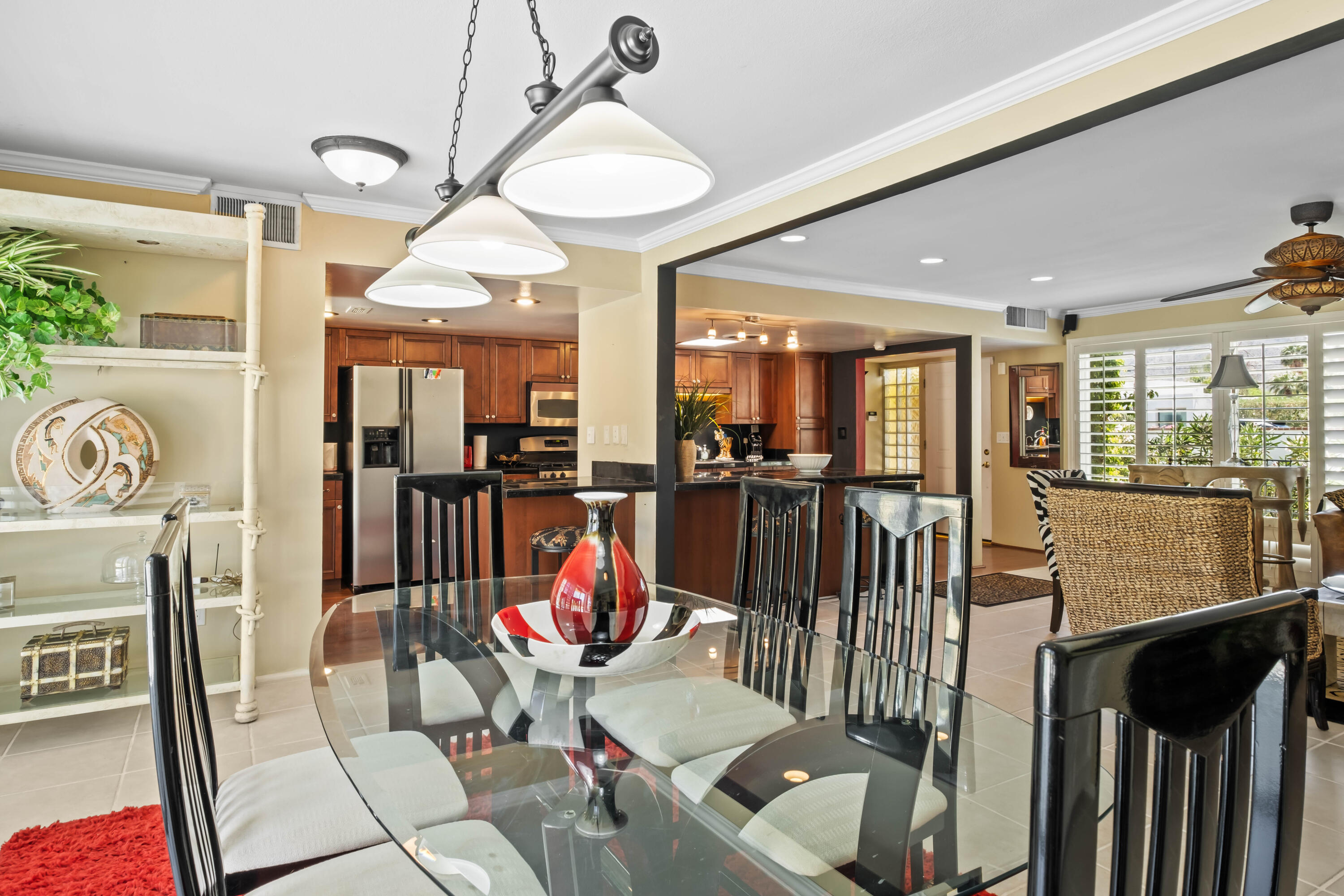 74460 Fairway Drive Palm Desert, CA 92260 - Photo 11 of 36 a view of a very nice looking dining room with furniture water view and a chandelier