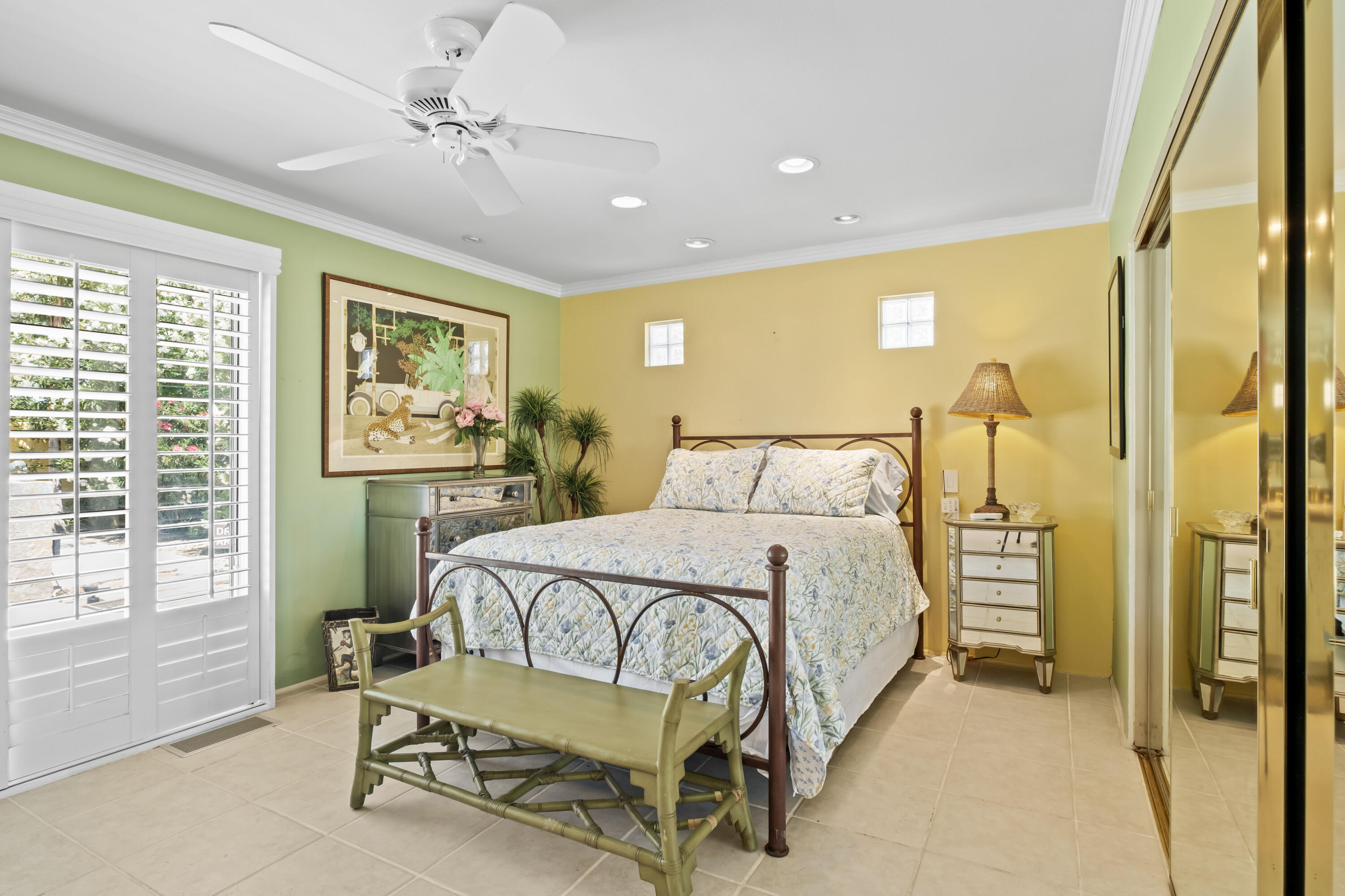 74460 Fairway Drive Palm Desert, CA 92260 - Photo 16 of 36 a bedroom with a bed chair and a window