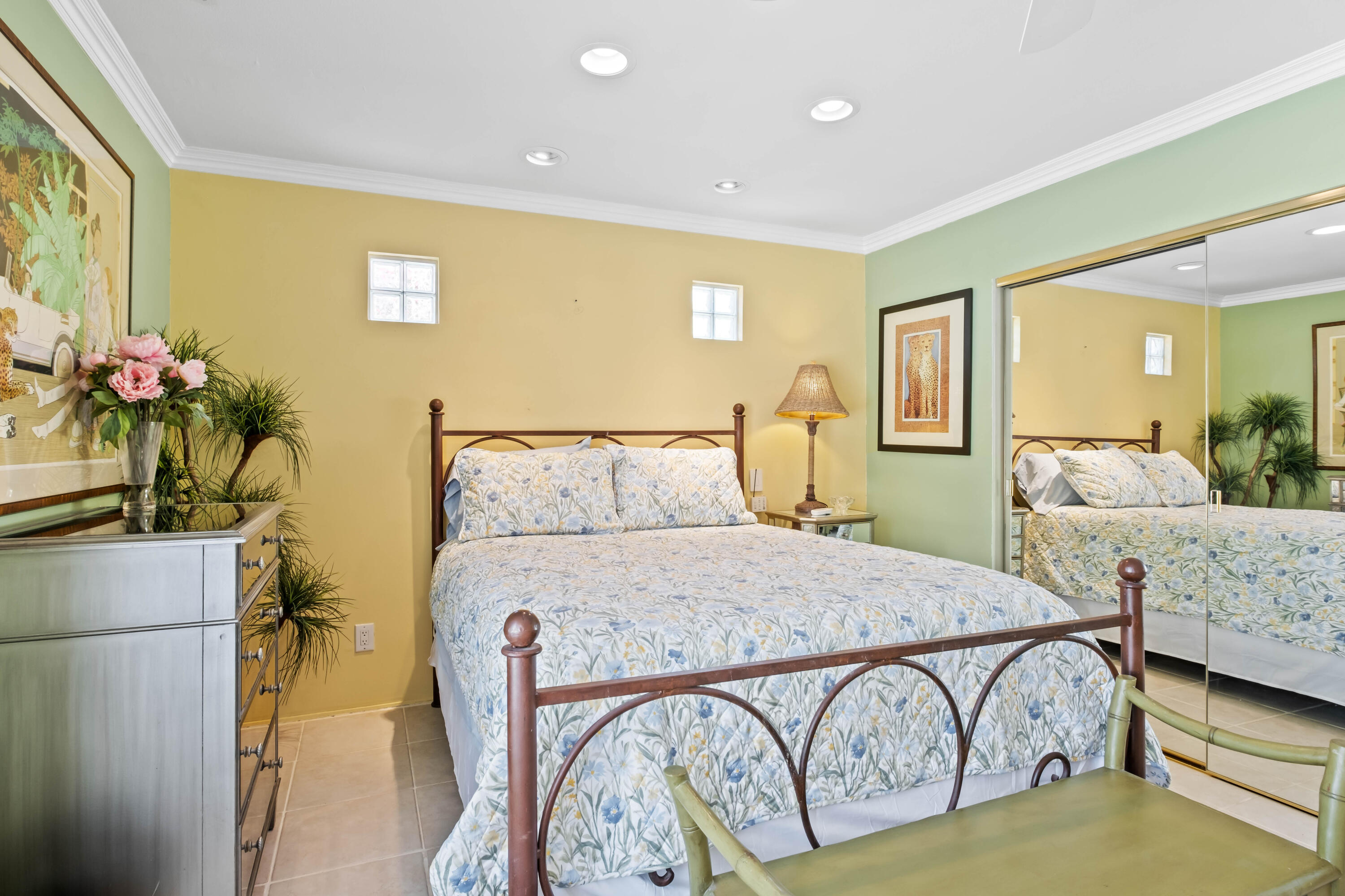 74460 Fairway Drive Palm Desert, CA 92260 - Photo 17 of 36 a spacious bedroom with a bed and a couch