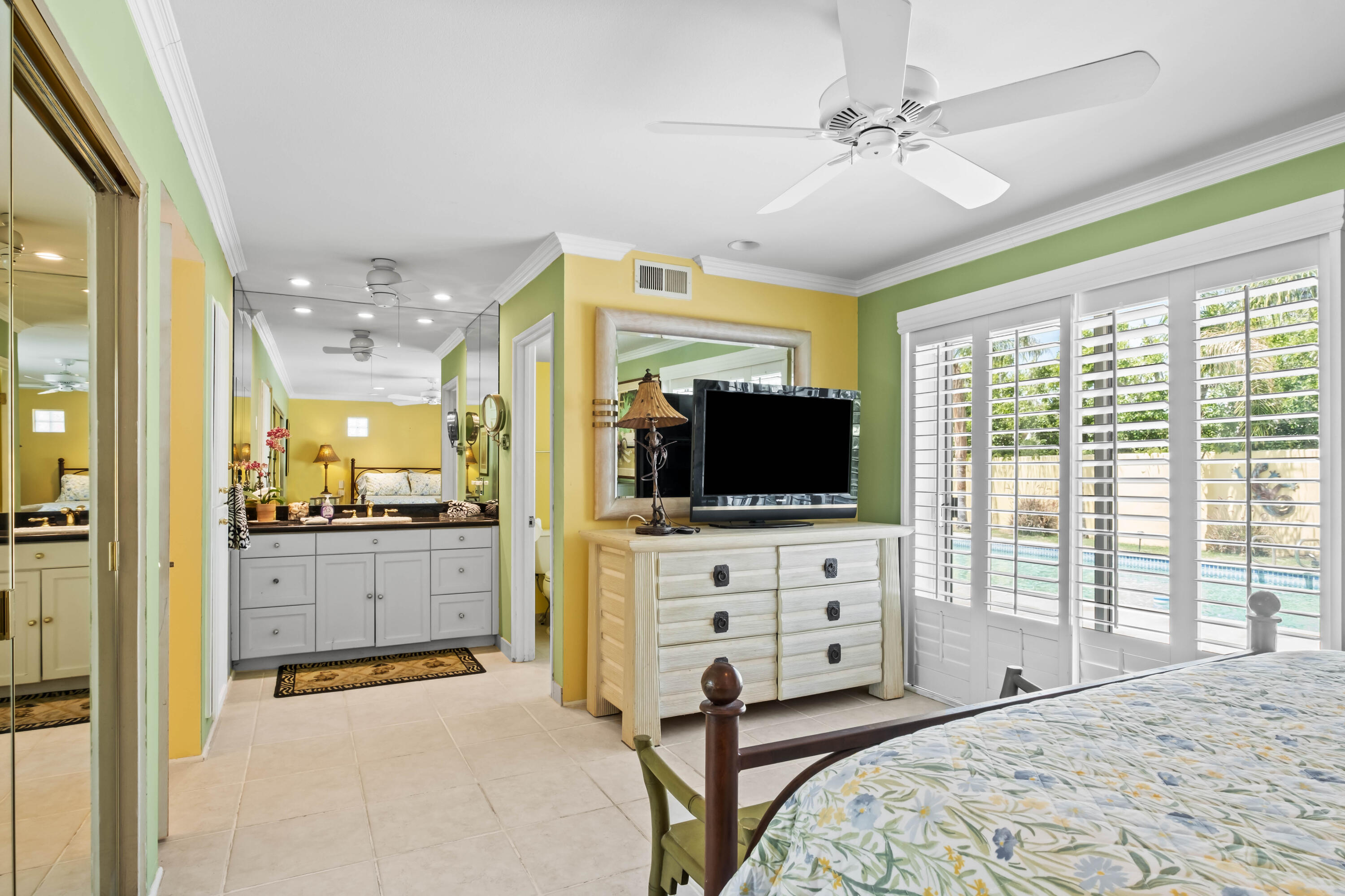 74460 Fairway Drive Palm Desert, CA 92260 - Photo 19 of 36 a bedroom with furniture and a flat screen tv