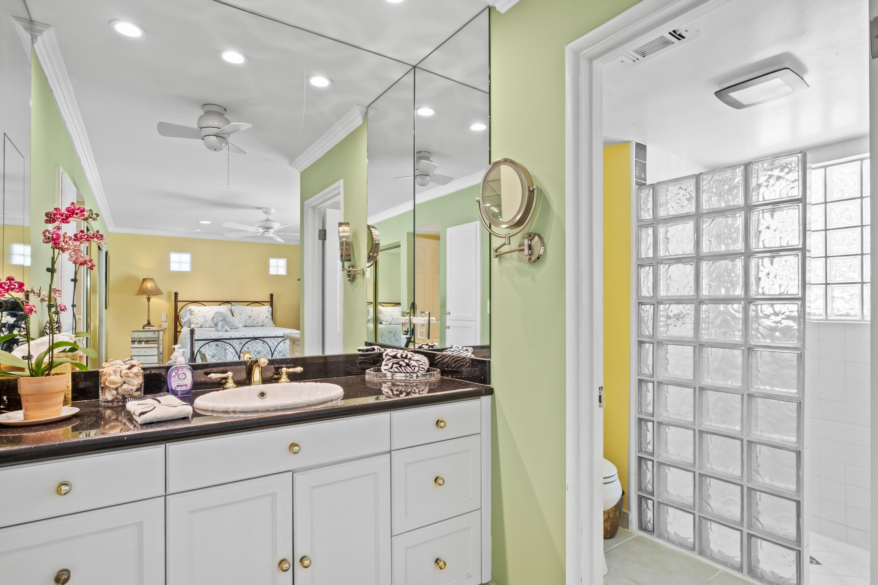 74460 Fairway Drive Palm Desert, CA 92260 - Photo 20 of 36 a bathroom with a double vanity sink and a mirror