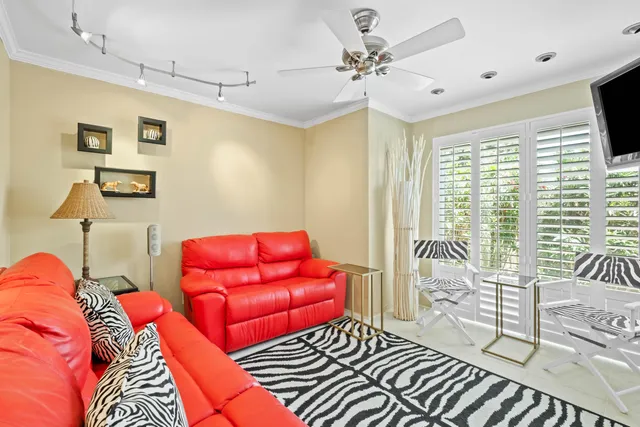 a bedroom with furniture and wooden floor