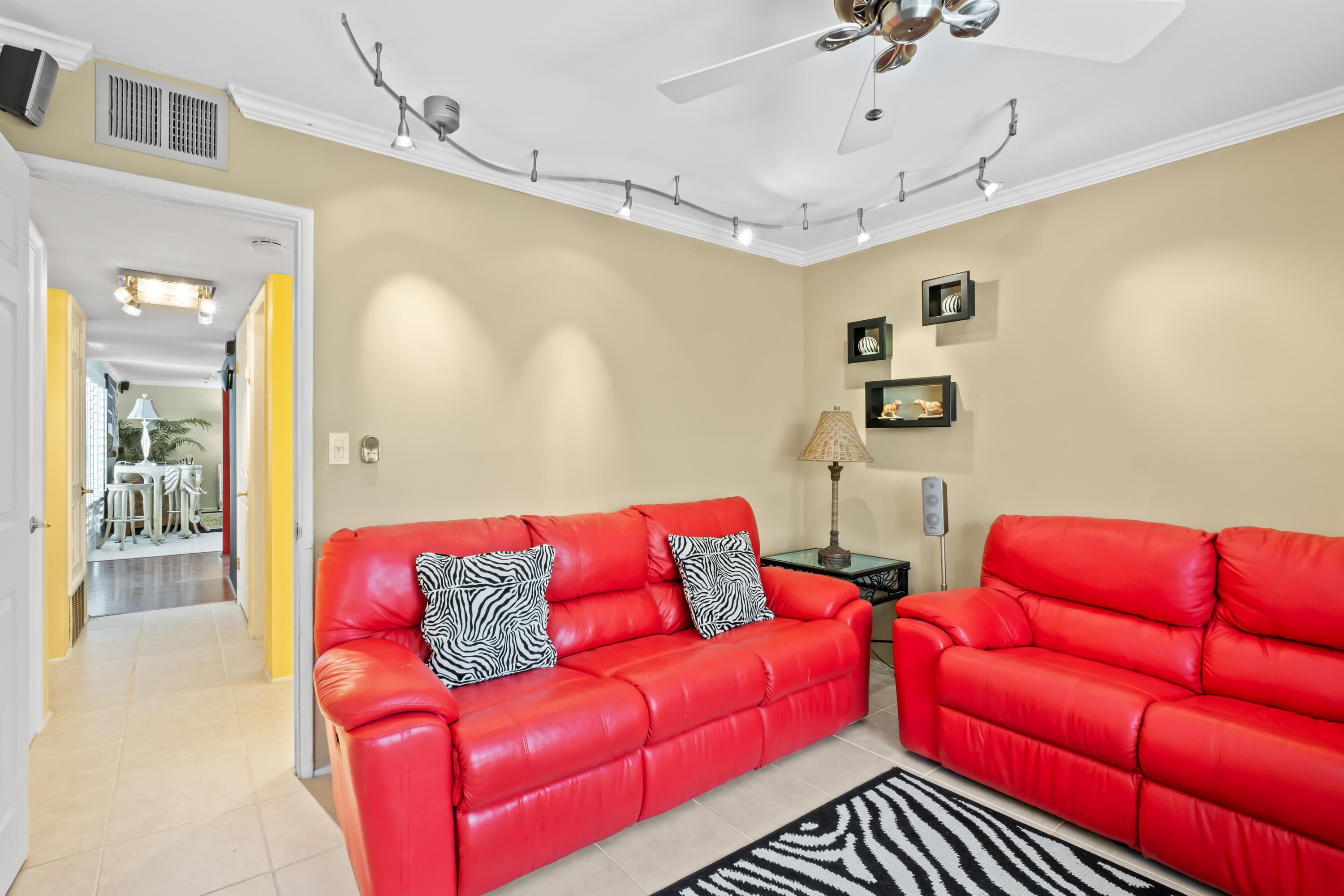74460 Fairway Drive Palm Desert, CA 92260 - Photo 25 of 36 a blue couch sitting in a living room with a couch