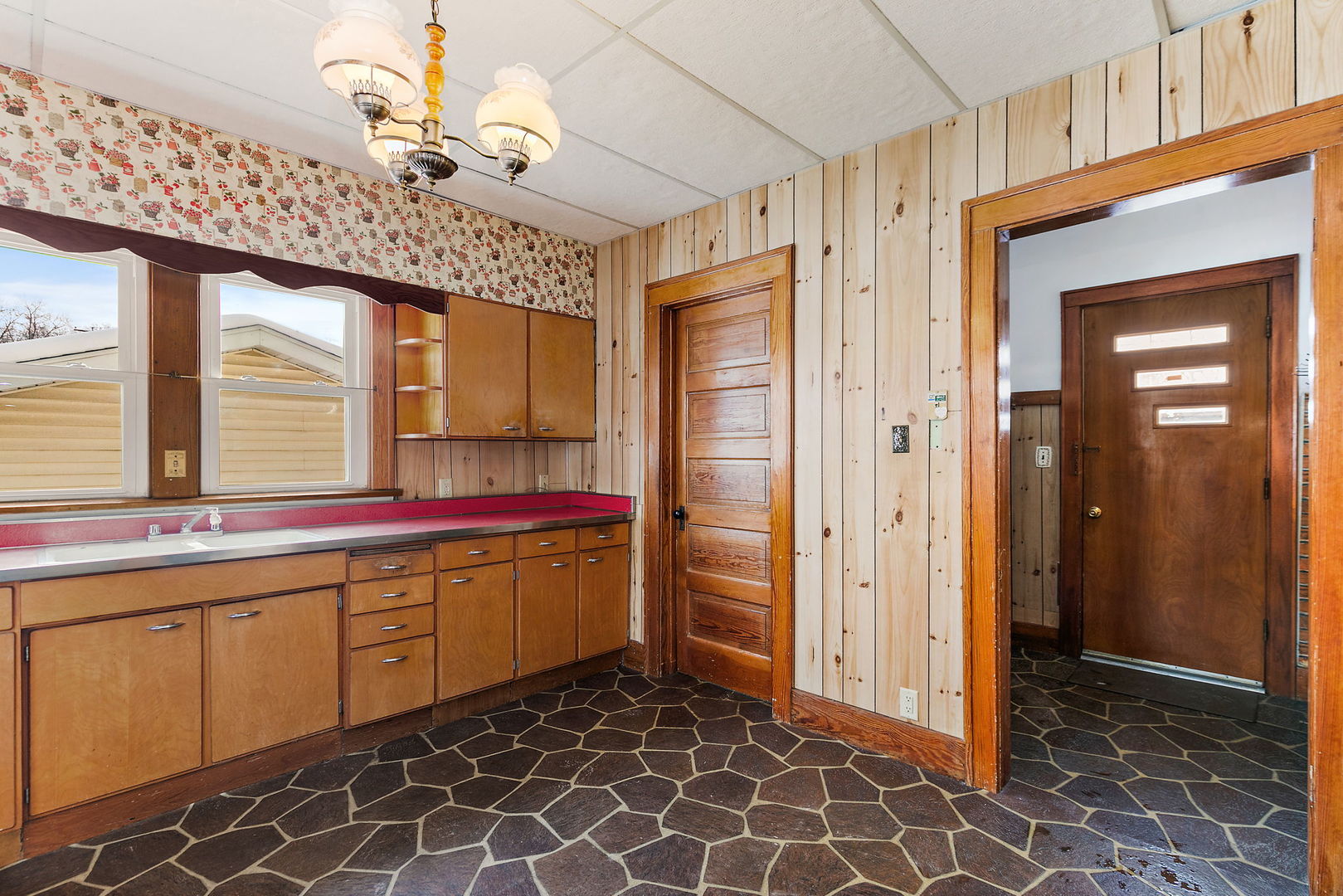 844 South 1st Street DeKalb, IL 60115 - Photo 12 of 26 a view of a kitchen with windows