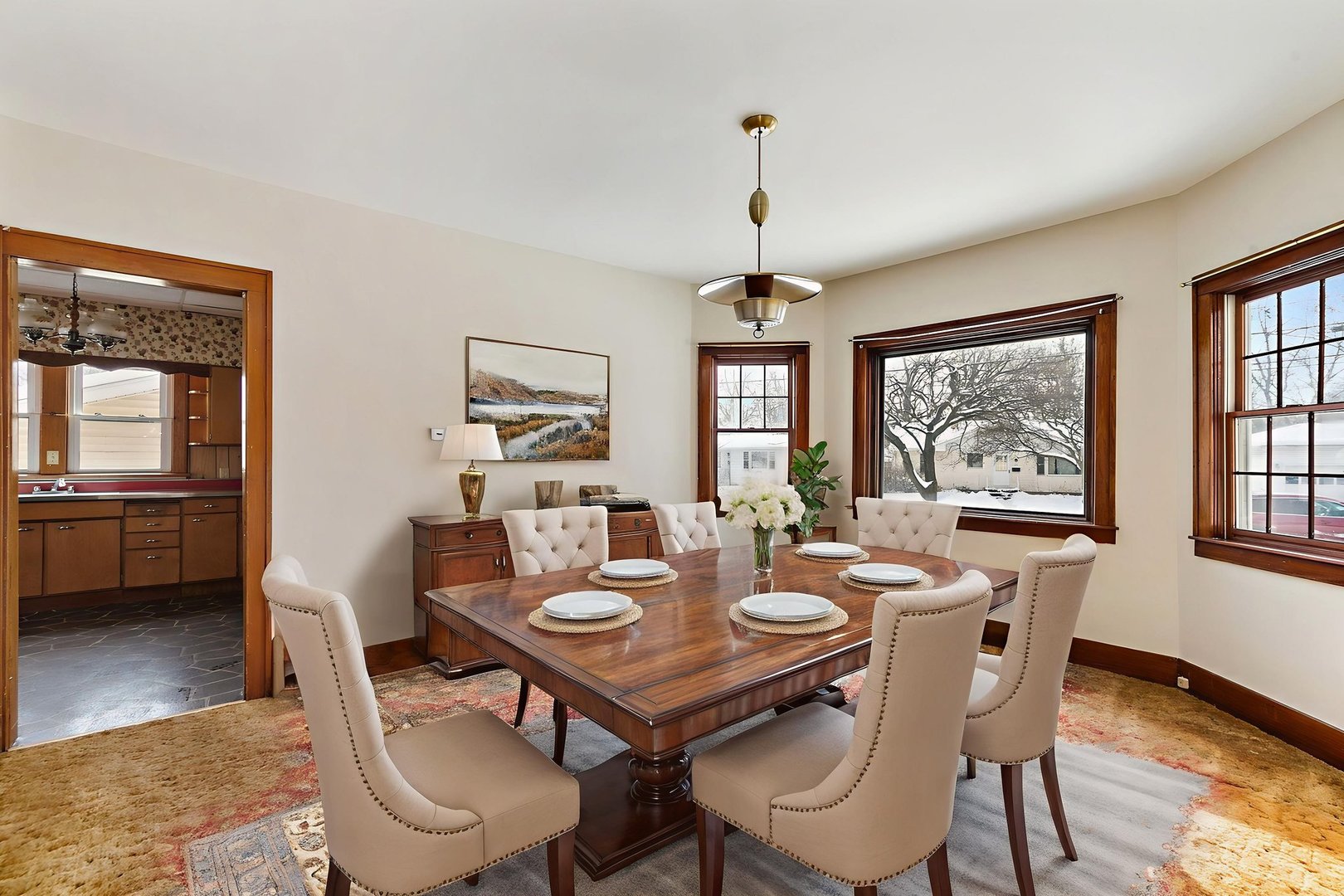 844 South 1st Street DeKalb, IL 60115 - Photo 8 of 26 a view of a dining room with furniture window and wooden floor
