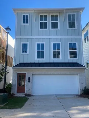 a front view of a building with yard