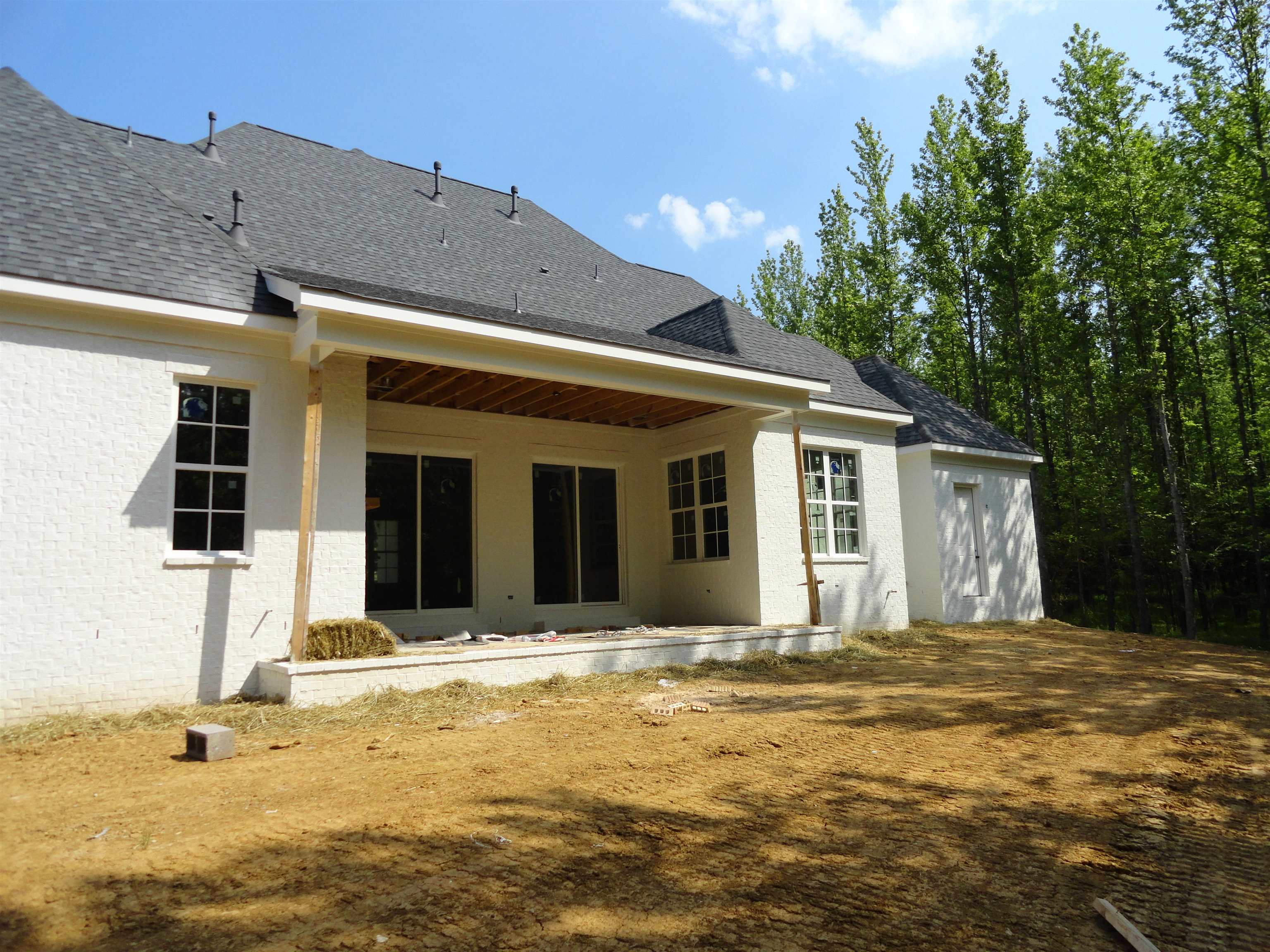 12671 Miss Cloud Road Collierville, TN 38017 - Photo 5 of 23 a front view of a house with a outdoor space